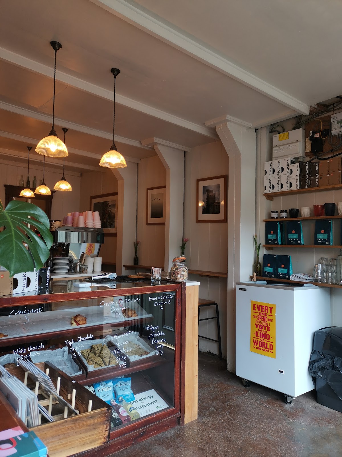 Counter and pastry cabinet inside the cafe