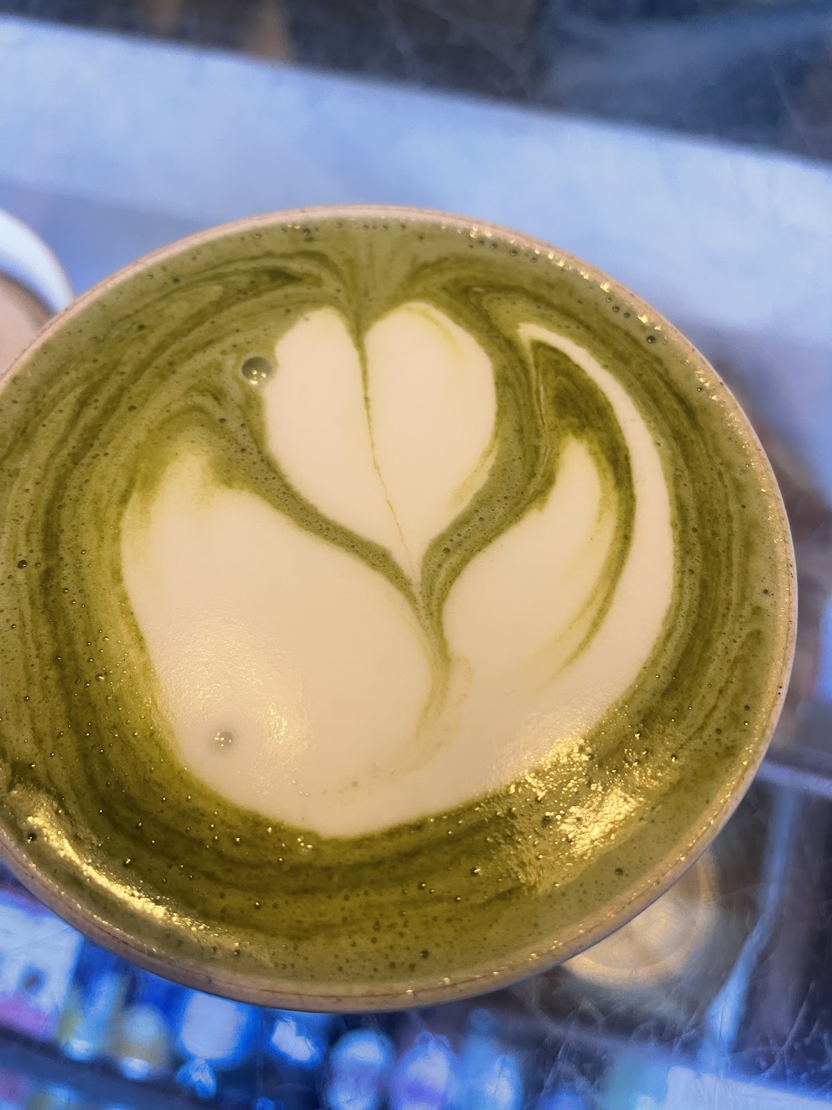 Matcha latte with tulip latte art at Marketplace Coffee Hexham