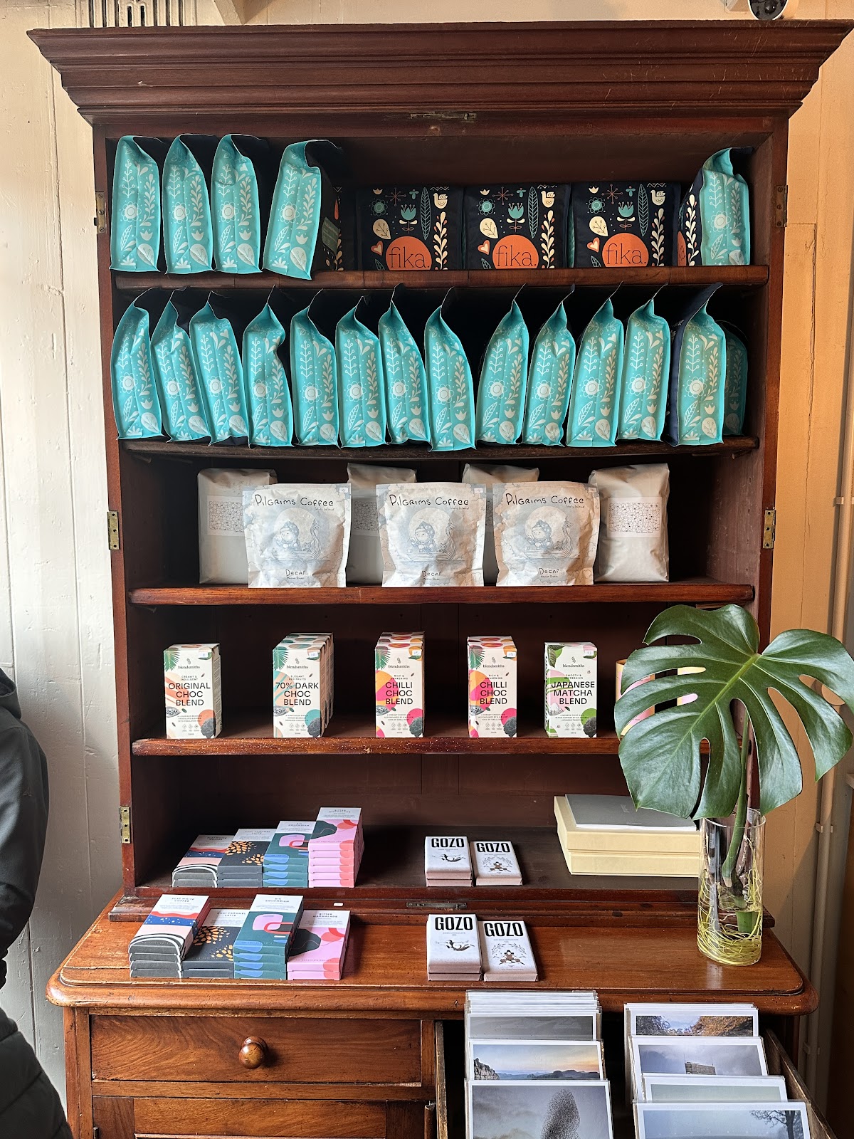 Shelf of fika beans, Pilgrims coffee and Blendsmiths chocolate